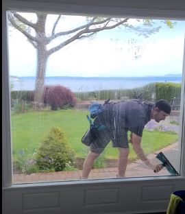 Window Cleaning Overlooking Pugut Sound in Everett, WA